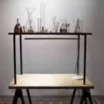 Annie Ratti - Essenza, 2009 - Essenze, profumi, ampolle di vetro, centrifuga, lampada, 2 tavoli (legno metallo linoleum) -  Agostino Osio