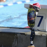 A prosthetic leg sits near the pool at the ipc swimming world championship in Montrael
