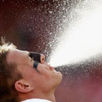Texans player JJ Watt spits water before a game against the ers in San Francisco