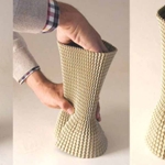 Cardboard vase<br>Prototipo 2009 - 2010 <br>Versione in ceramica produzione Skitsch<br>Certi oggetti hanno una predisposizione naturale a trasformarsi in qualcosa d'altro.<br> il caso degli involucri in cartone ondulato nati per imballare e proteggere bottiglie e vasi in vetro destinati alla spedizione. La loro caratteristica elasticit e deformabilit consente di modellarne facilmente la forma originale per dar vita a innumerevoli variabili morfologiche. I tubolari di cartone modellati vengono poi calzati su una mezza bottiglia di plastica.<br>Alcune forme di vaso sono state riprodotte in ceramica e attualmente sono prodotte da Skitsch
