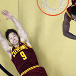 Cavaliers players fall on the court during a game in New Orleans