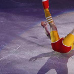 Javier Fernandez falls during a figuring skating exhibition in Tokyo