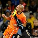 Sports: 1st prize singles - Mike Hutchings, South Africa, Reuters - Netherlands Demy de Zeeuw is kicked in the face by Uruguay's Martin Cceres during World Cup semi-final, Cape Town, 6 July