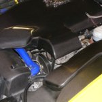 Il poderoso motore della Grifo90  abbracciato da un vano motore in carbonio con al proprio centro il grande stemma del Grifone